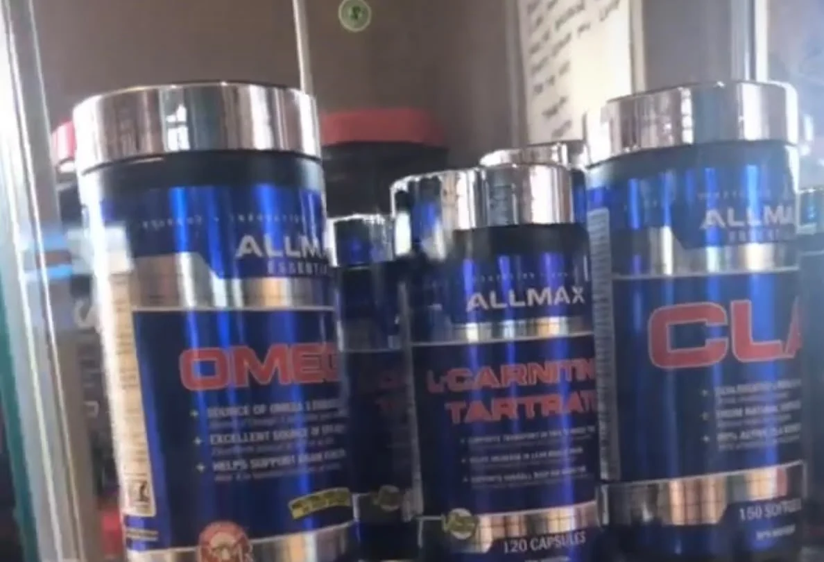ALLMAX supplement selection on the studio shelf